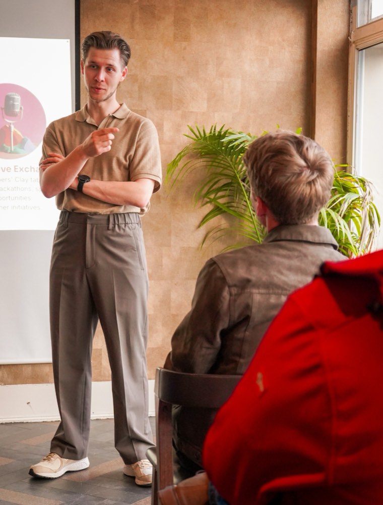 Mateusz answering founder questions at a community event